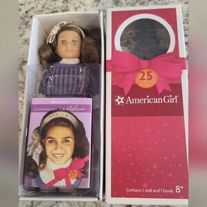 NEW American Girl Mini Doll with Book - Purple Outfit. Rebecca